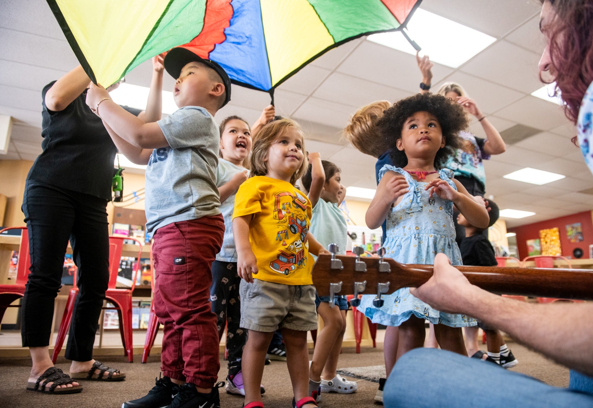 A group of kids at a music class. 