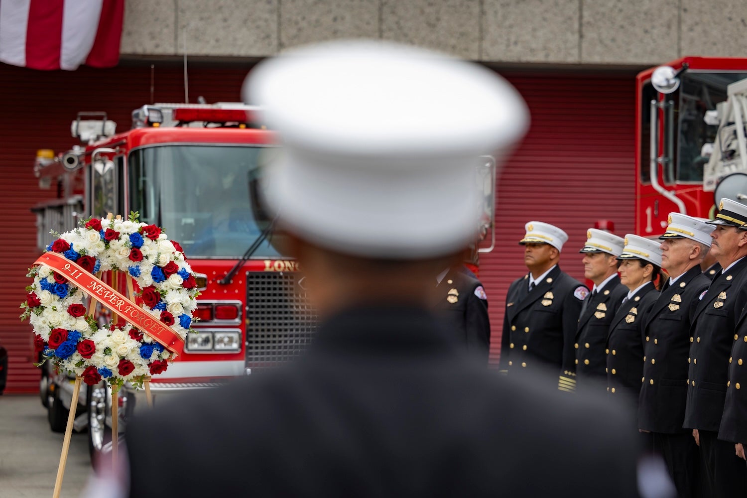Firefigthers stand in reflection and remembrance of 9/11. Firefigthers stand in reflection and remembrance of 9/11.
