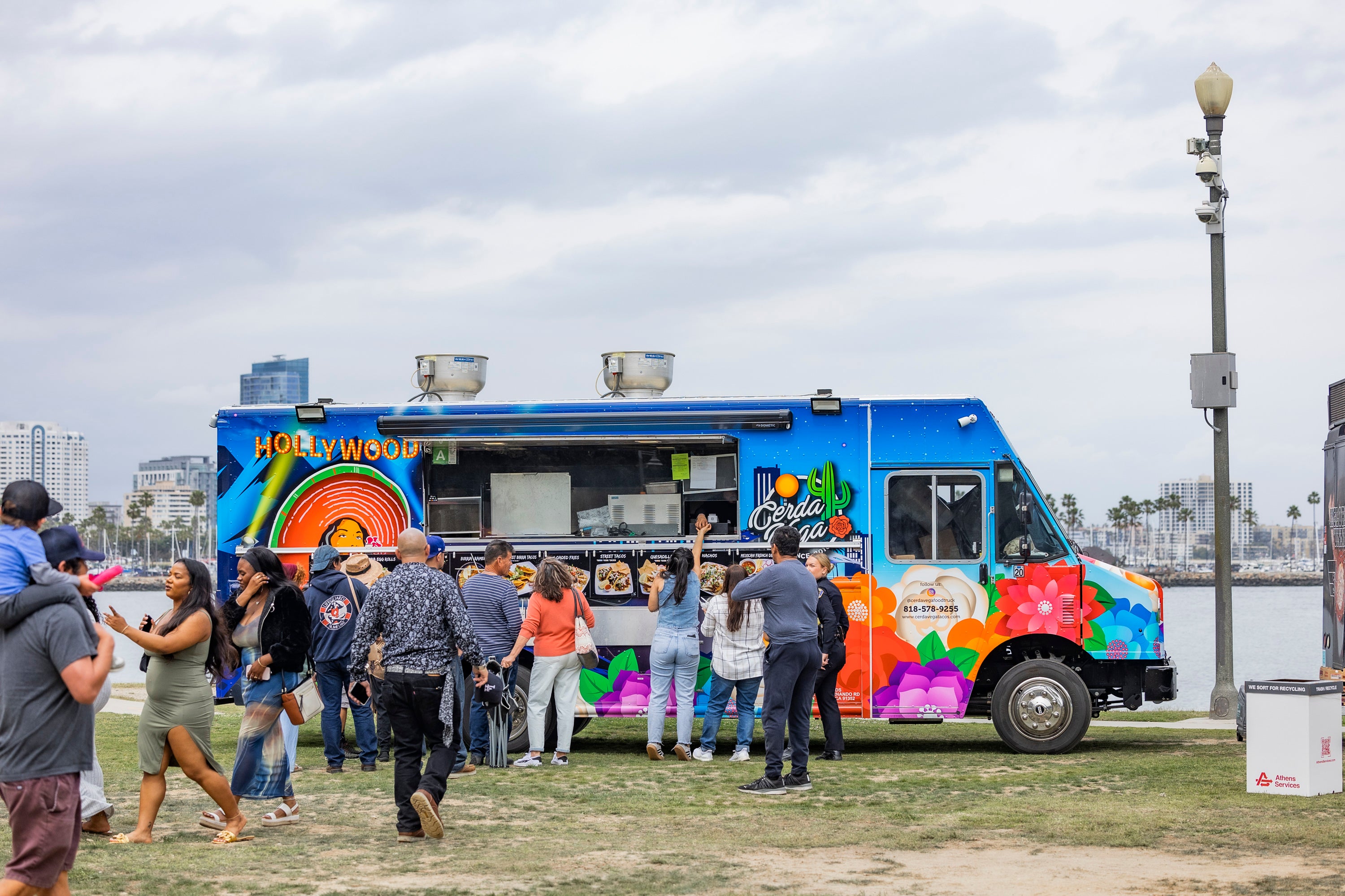 Blue food truck by the beach Blue food truck by the beach