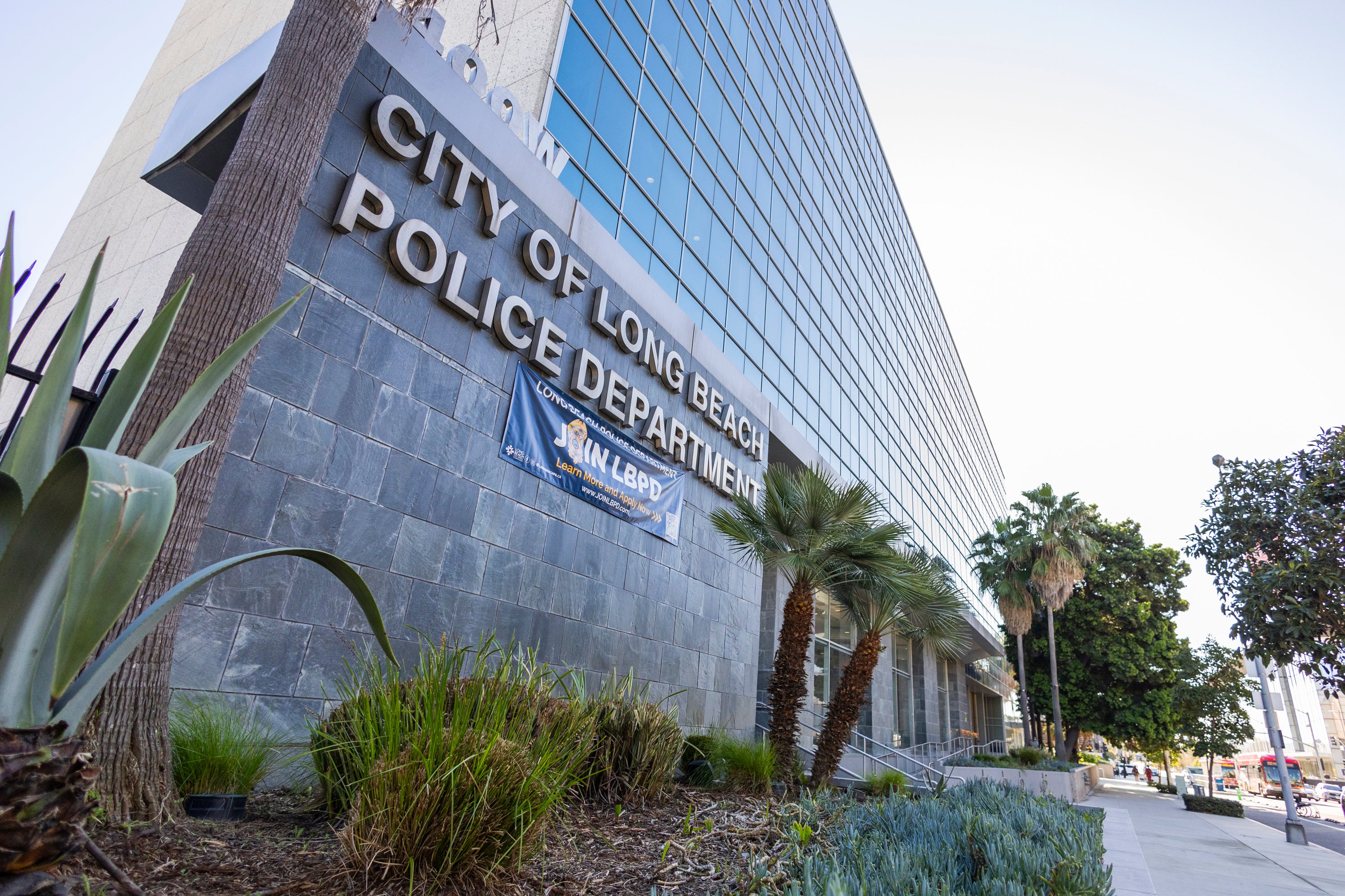 Brown building with a sign that says City of Long Beach Police Department Brown building with a sign that says City of Long Beach Police Department