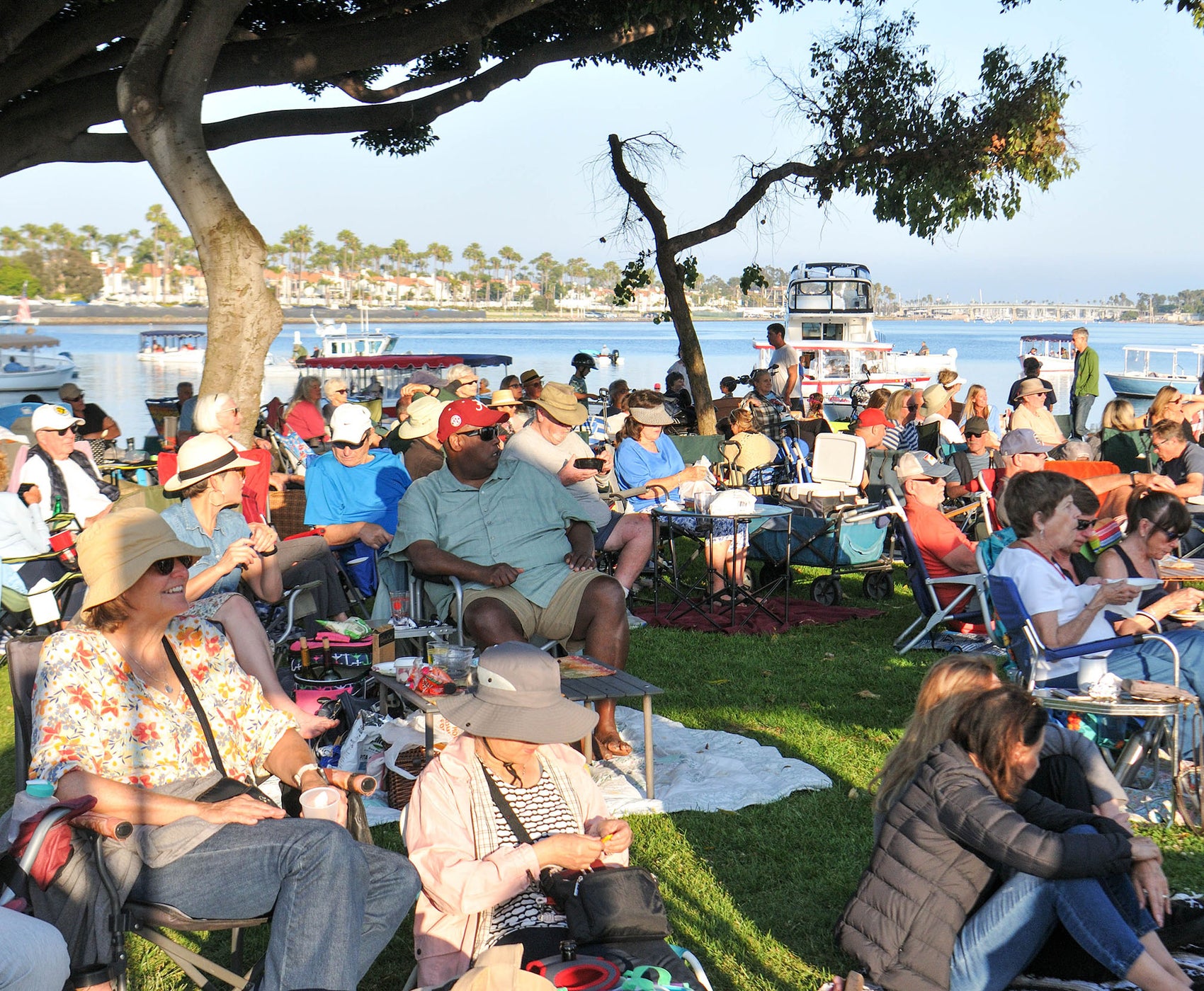 Onlookers enjoying the City’s Department of Parks, Recreation and Marine’s summer concert series. Onlookers enjoying the City’s Department of Parks, Recreation and Marine’s summer concert series.