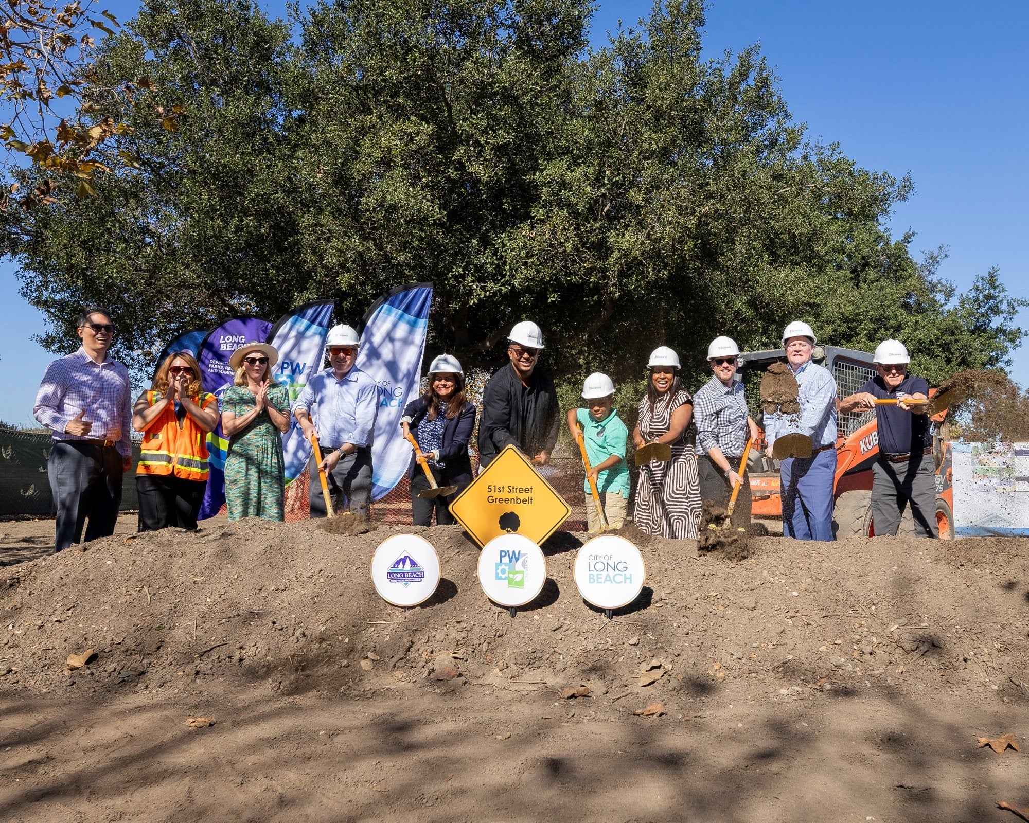 Group of people with shovels Group of people with shovels