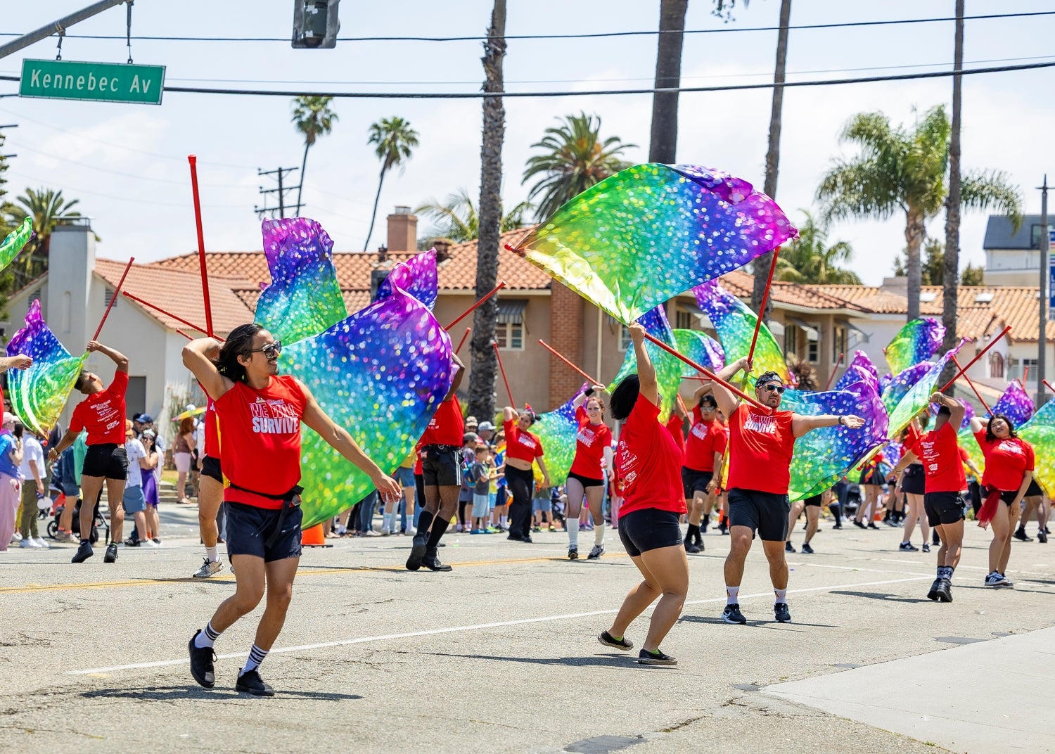Dancers waving colorful flags Dancers waving colorful flags
