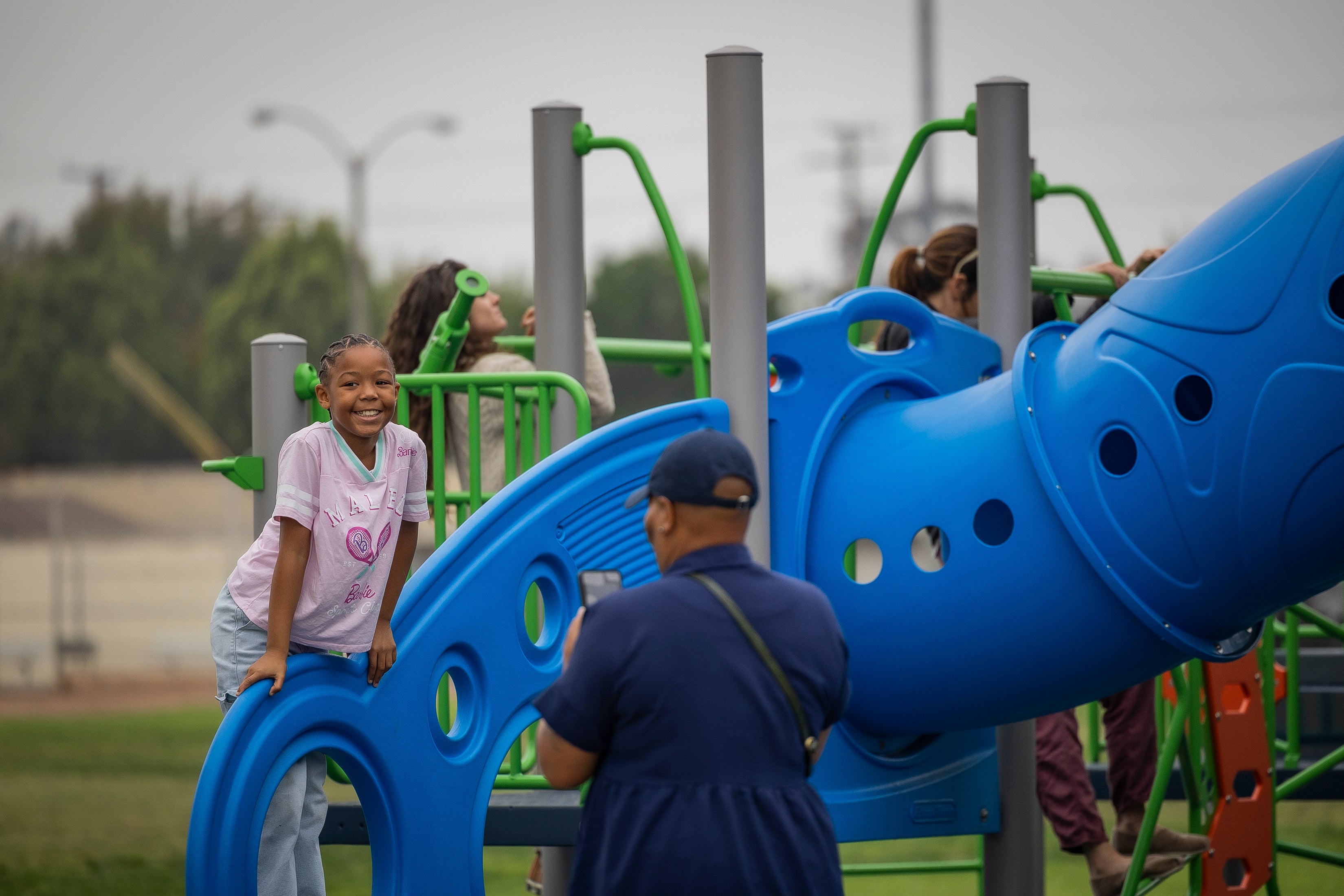 A girl and her mom at the playground A girl and her mom at the playground