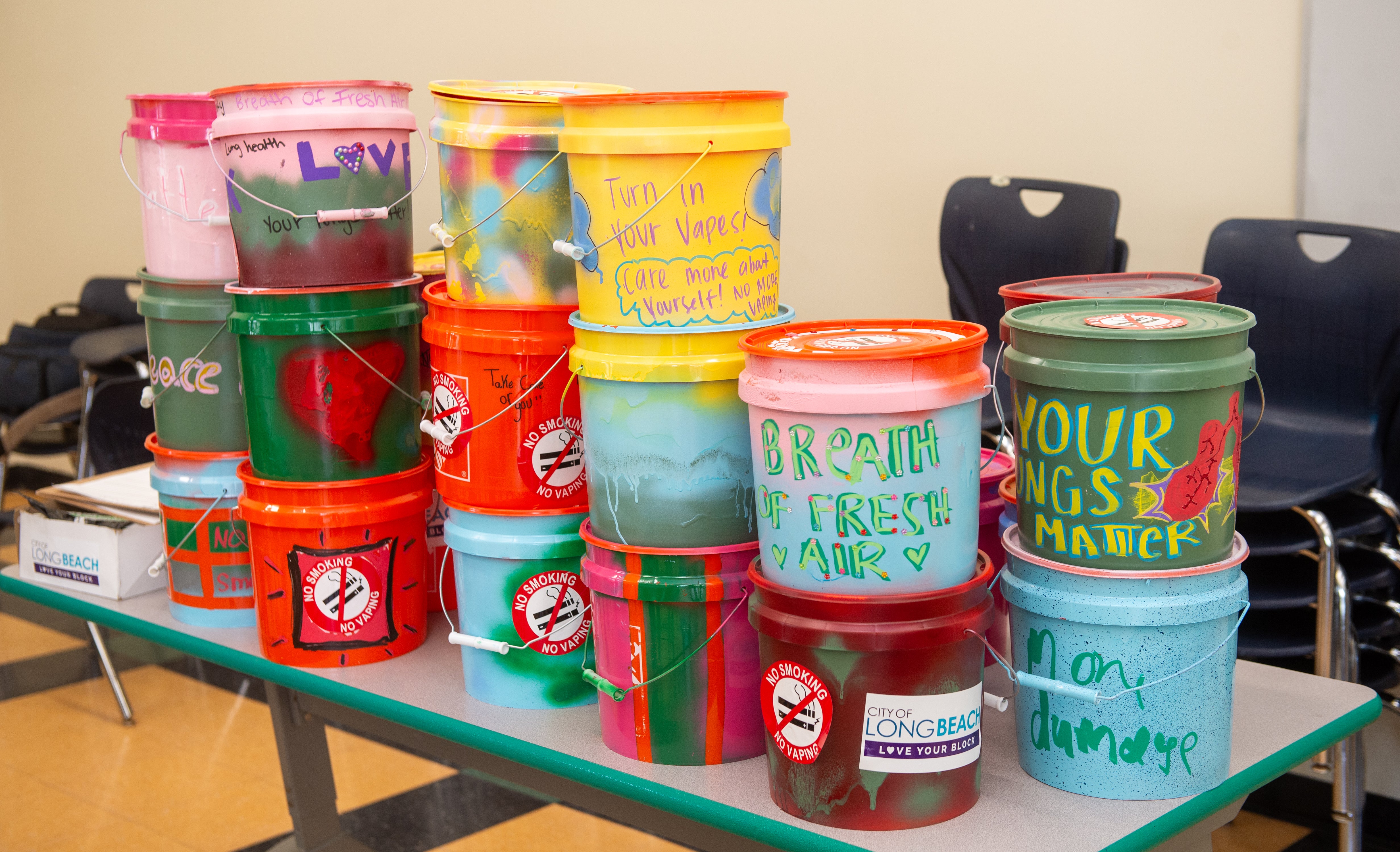 A stack of colorful buckets 