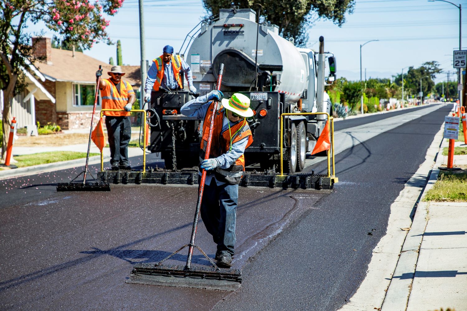 Public Works working on a slurry crack seal Public Works working on a slurry crack seal