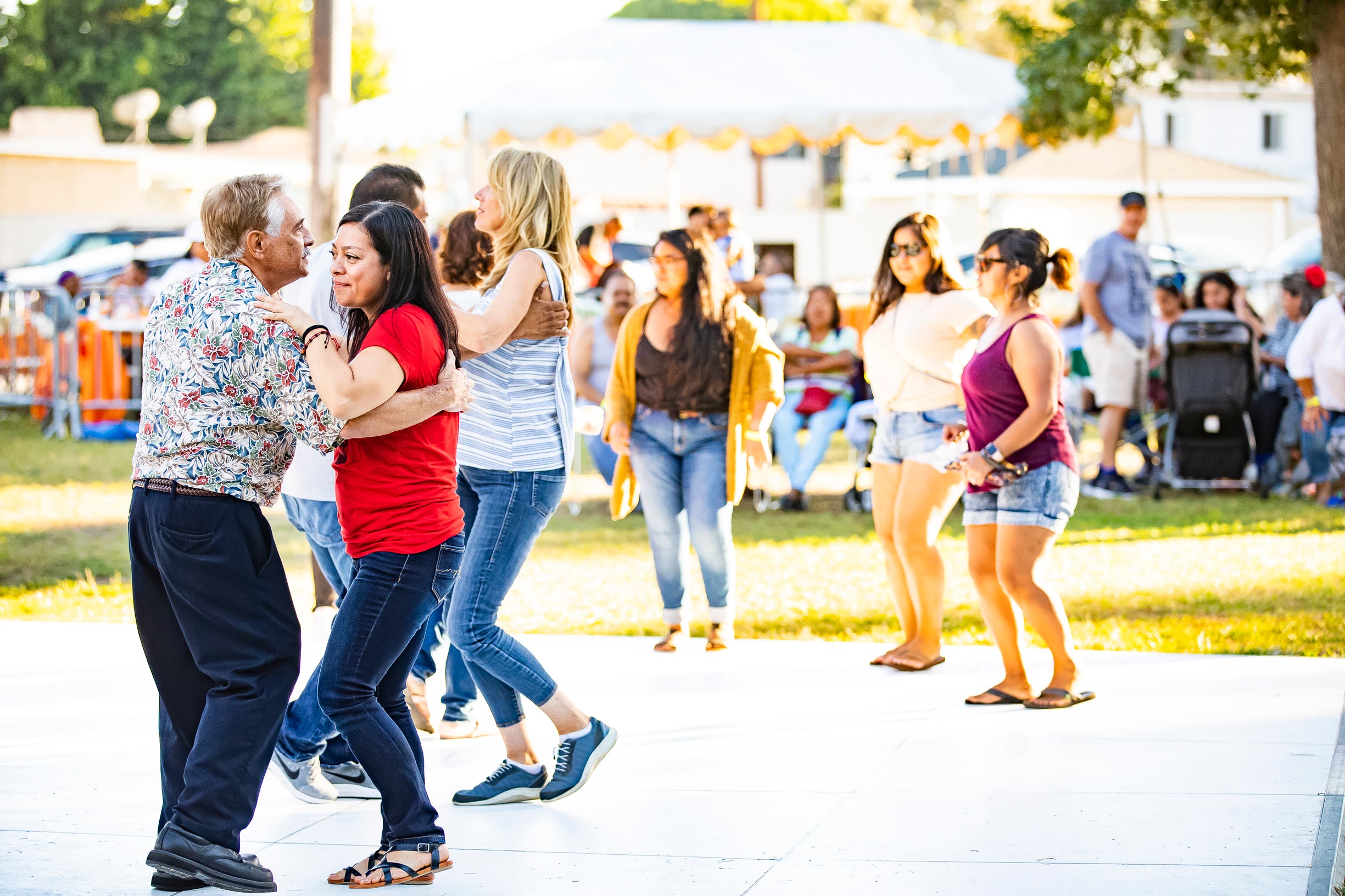 Groups of people dancing in the park Groups of people dancing in the park