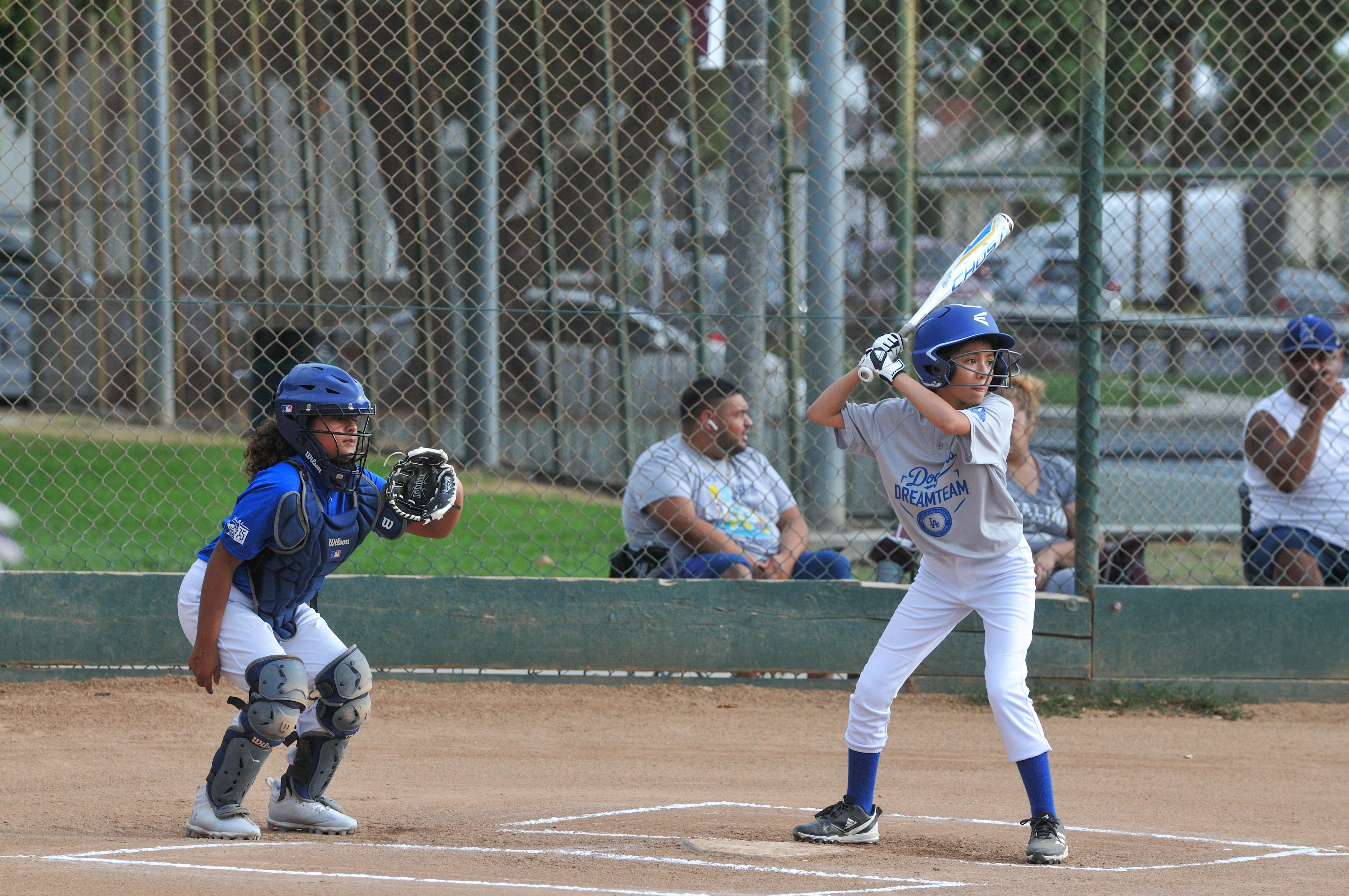 A young boy up to bat in a youth sports league A young boy up to bat in a youth sports league