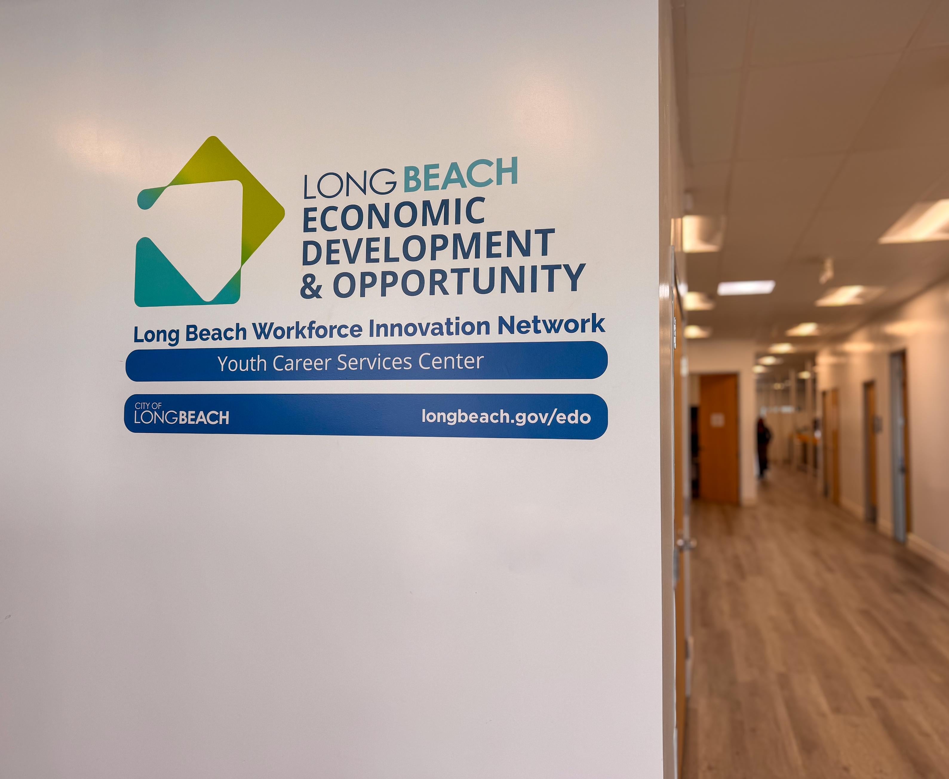 Hallway with logo of Long Beach Economic Development & Opportunity Department. Hallway with logo of Long Beach Economic Development & Opportunity Department.