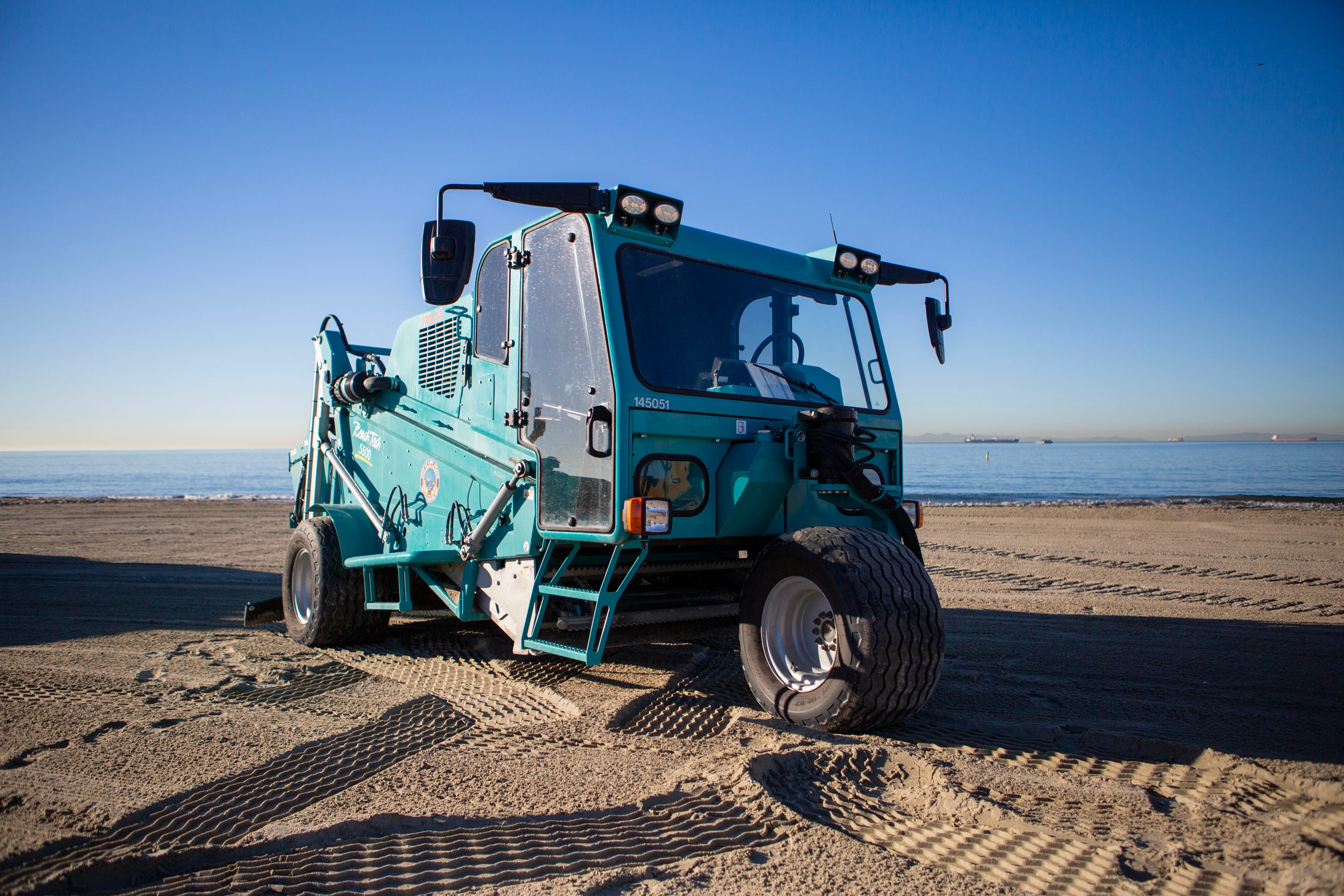 Debris collector on beach 
