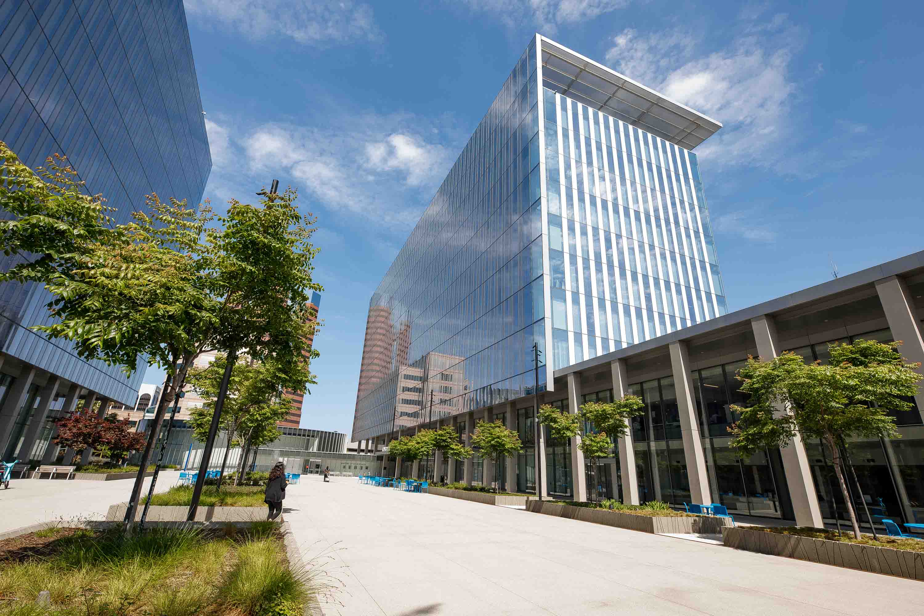 Exterior of a mirrored high rise building. Exterior of a mirrored high rise building.